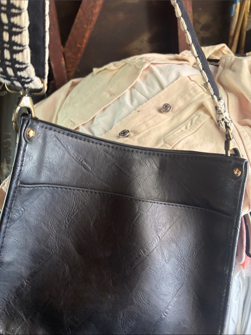 Black Leather Shoulder Bag with Patterned Strap